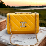 Yellow embroidered sling bag